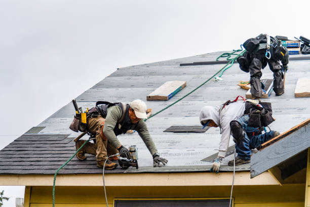 Professional Gutter Installation technician working in Slocum, RI